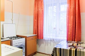 Apartment, 1 Doppelbett und Schlafsofa, Stadtblick | Bügeleisen/Bügelbrett, kostenloses WLAN, Bettwäsche