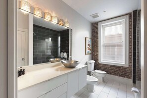 Bathtub, hair dryer, towels