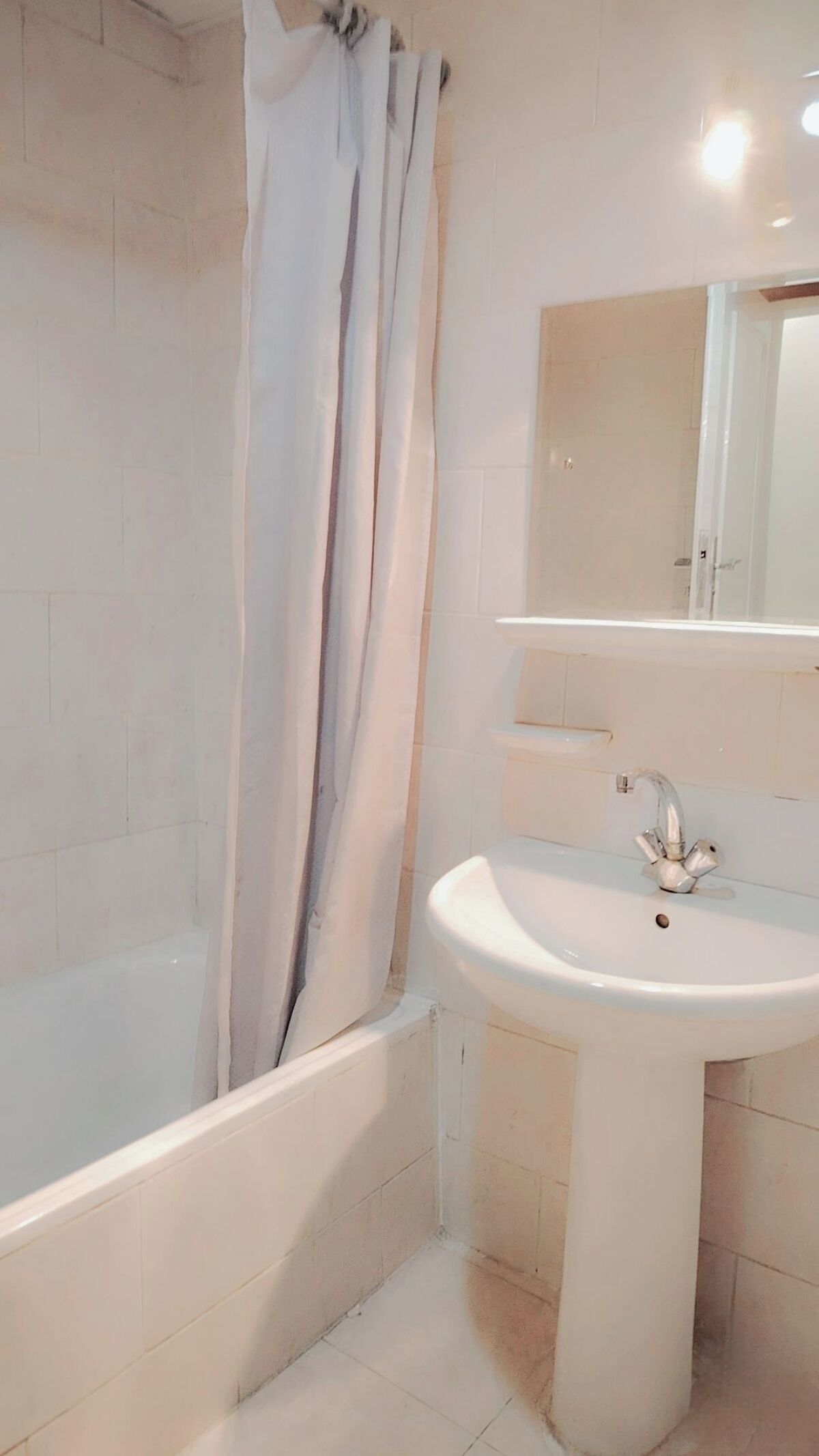 combined shower/bathtub, free toiletries, hair dryer, bathrobes