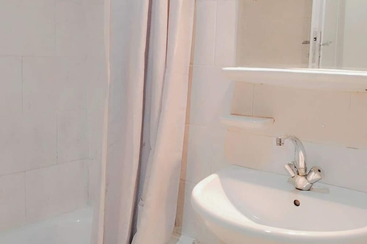 combined shower/bathtub, free toiletries, hair dryer, bathrobes