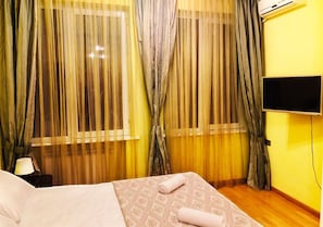 Premium bedding, down duvets, blackout curtains, soundproofing
