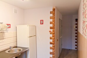 Apartment, Mehrere Betten, Stadtblick | Eigene Küche | Kühlschrank, Mikrowelle, Herdplatte, Wasserkocher