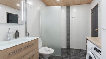 Superior Apartment, 1 Bedroom, Sauna, Lake View | Bathroom | Shower, hair dryer, heated floors, towels