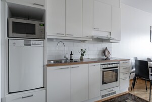 Superior Apartment, 1 Bedroom, Sauna, Lake View | Private kitchen | Full-size fridge, microwave, oven, stovetop
