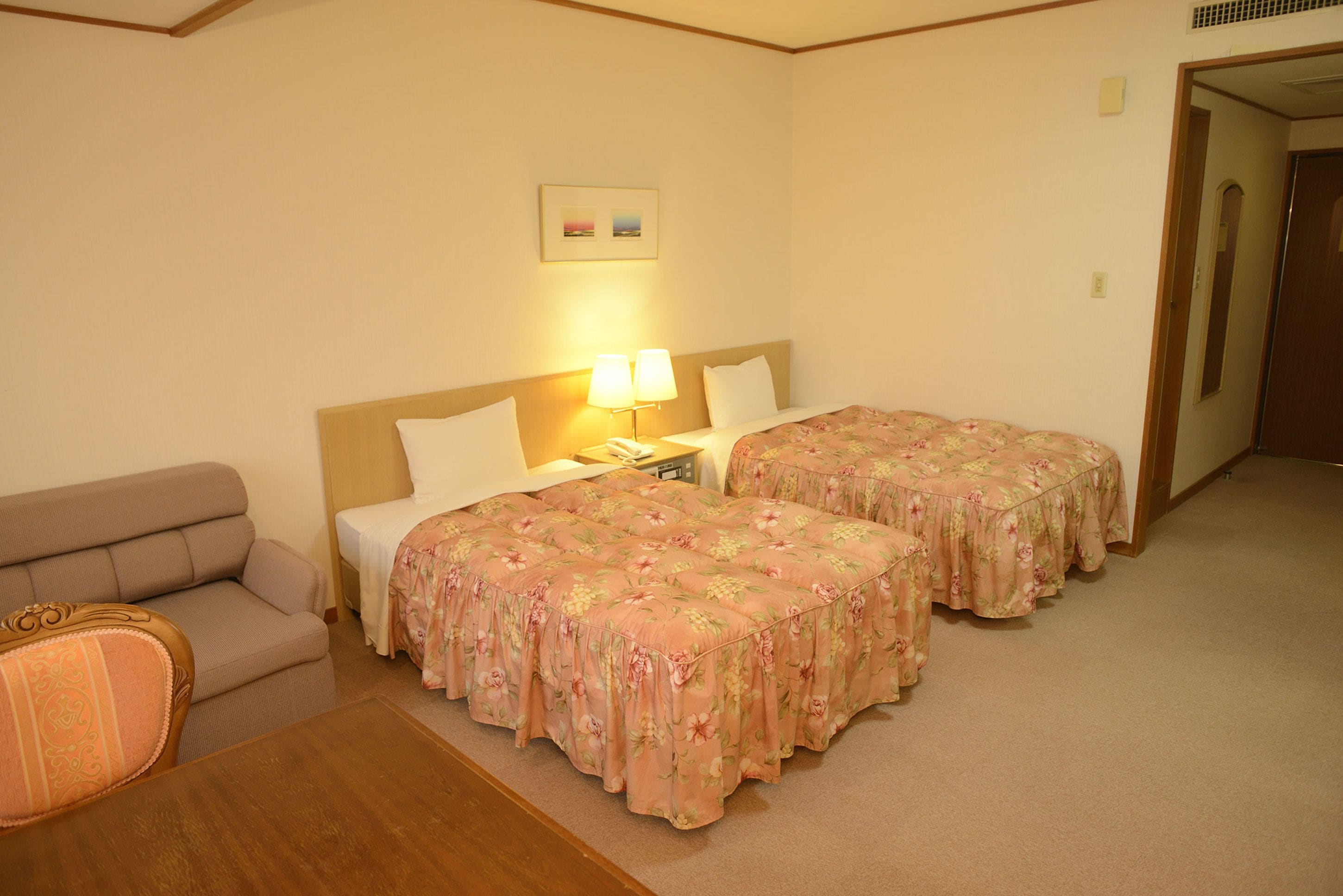 western room for 3 guests with private bathroom, partial ocean view, non smoking | in-room safe, free wifi, bed sheets