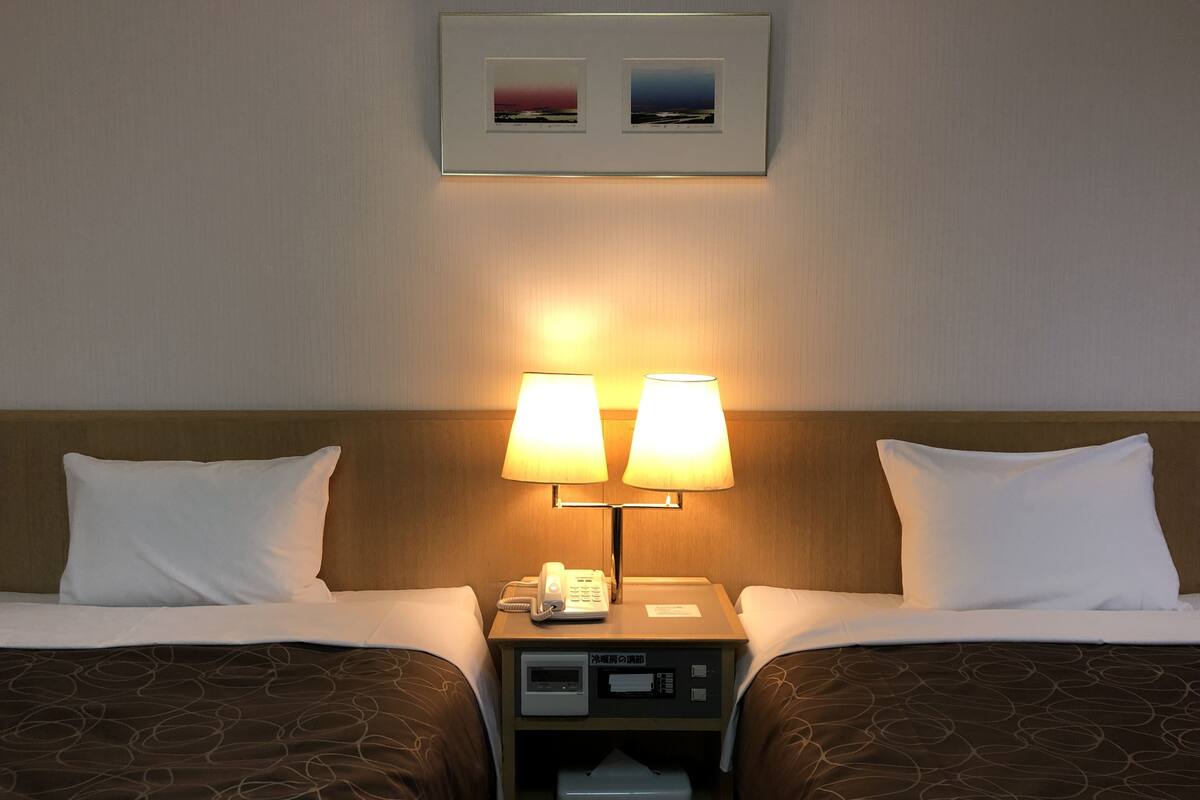 western room for 3 guests with private bathroom, partial ocean view, non smoking | in-room safe, free wifi, bed sheets
