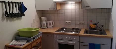 Fridge, oven, high chair