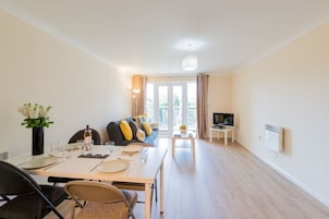 Executive Apartment, 2 Bedrooms, Non Smoking, 2 Bathrooms | Living area | Flat-screen TV, DVD player