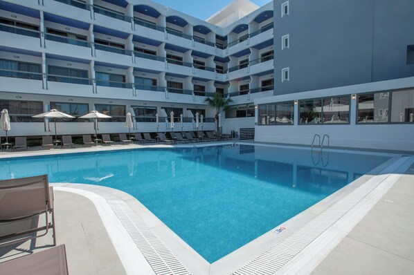 Outdoor pool, pool umbrellas, pool loungers