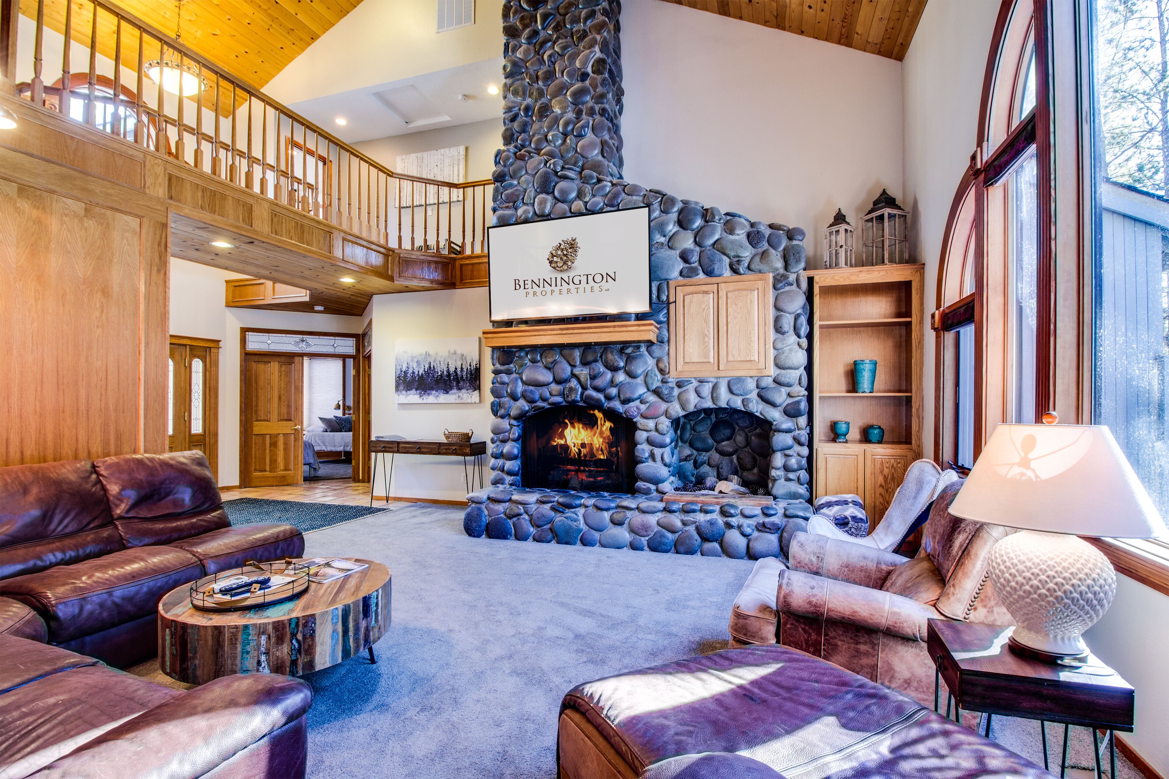 Flat-screen TV, fireplace, video games, foosball