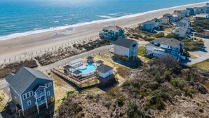 A coastal residential area with houses, a beach, and a swimming pool complex. - LegaSea | Private Beach Access, Pool + Hot Tub! (North Topsail Beach)