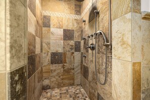 Bathtub, hair dryer, towels