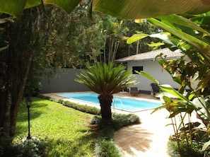 Outdoor pool, open 8:00 AM to 7:00 PM, pool umbrellas, sun loungers