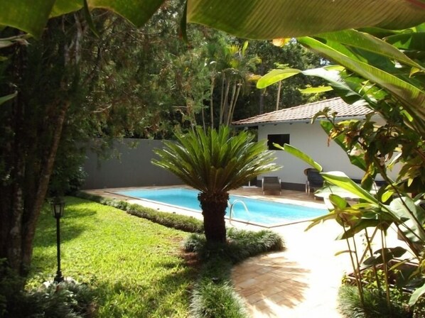Outdoor pool, open 8:00 AM to 7:00 PM, pool umbrellas, sun loungers