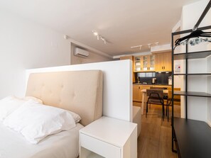 Iron/ironing board, travel crib, free WiFi, bed sheets