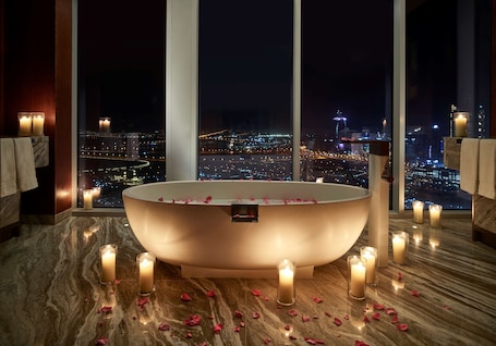 Presidential Suite, 1 King Bed | Bathroom | Separate tub and shower, deep soaking tub, hair dryer, slippers