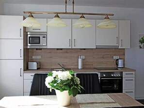 Imagen sin descripción, 4 de 7, botón