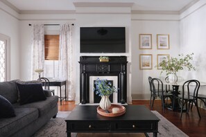 House, Multiple Beds, Non Smoking | Living area | 0-inch Smart TV with cable channels, TV, fireplace - Comfortable Escape 2BR Historic Downtown (Savannah)