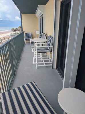 Terrace/patio - Sunrise Direct Ocean front 2-bedroom condo steps to the Beach at Daytona Beach (Daytona Beach Shores)