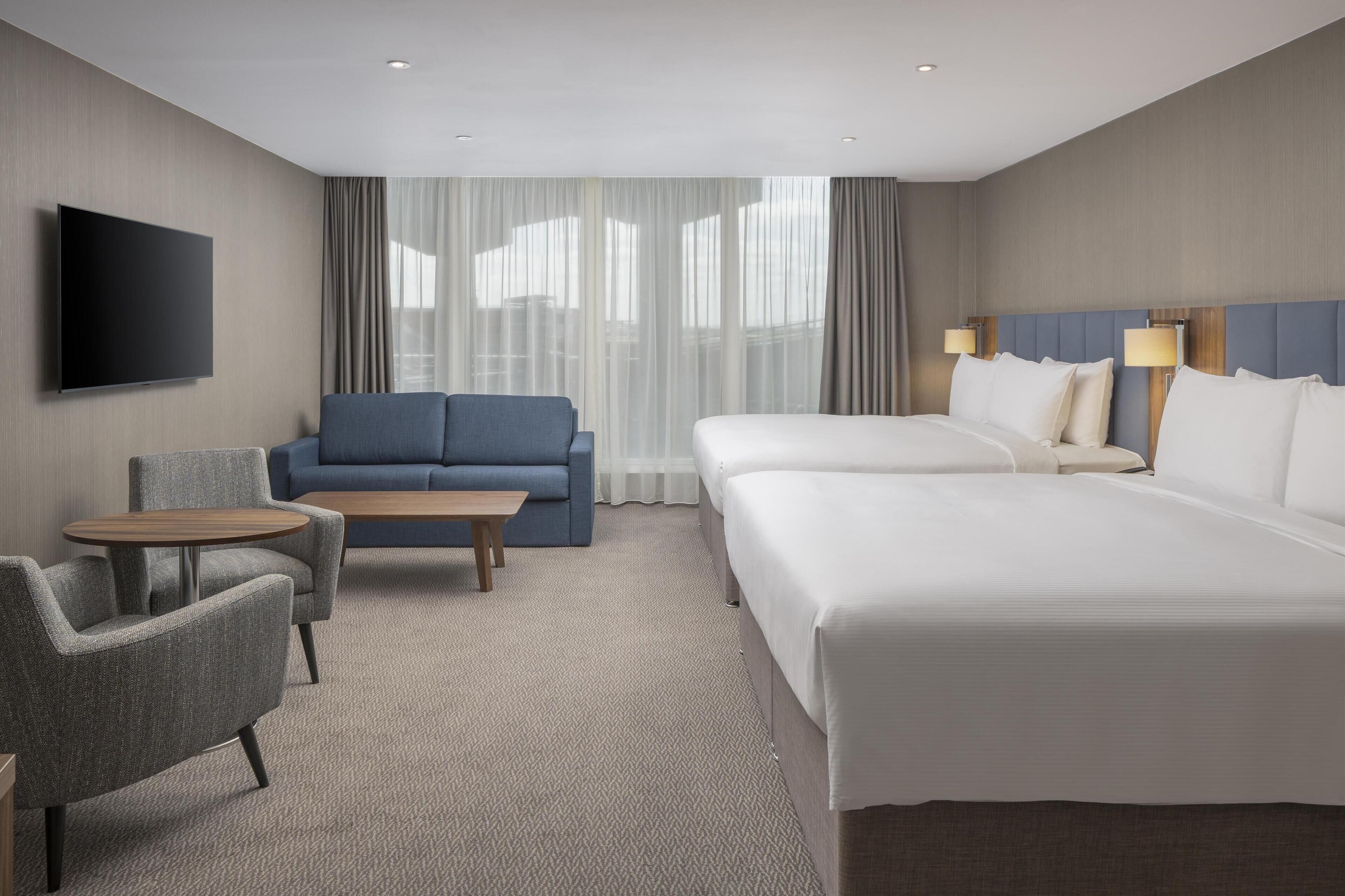 family room, multiple beds | living area | lcd tv