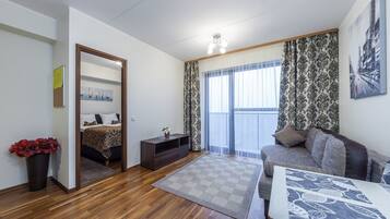 Luxury Apartment, 1 Bedroom, City View | Living area | Flat-screen TV