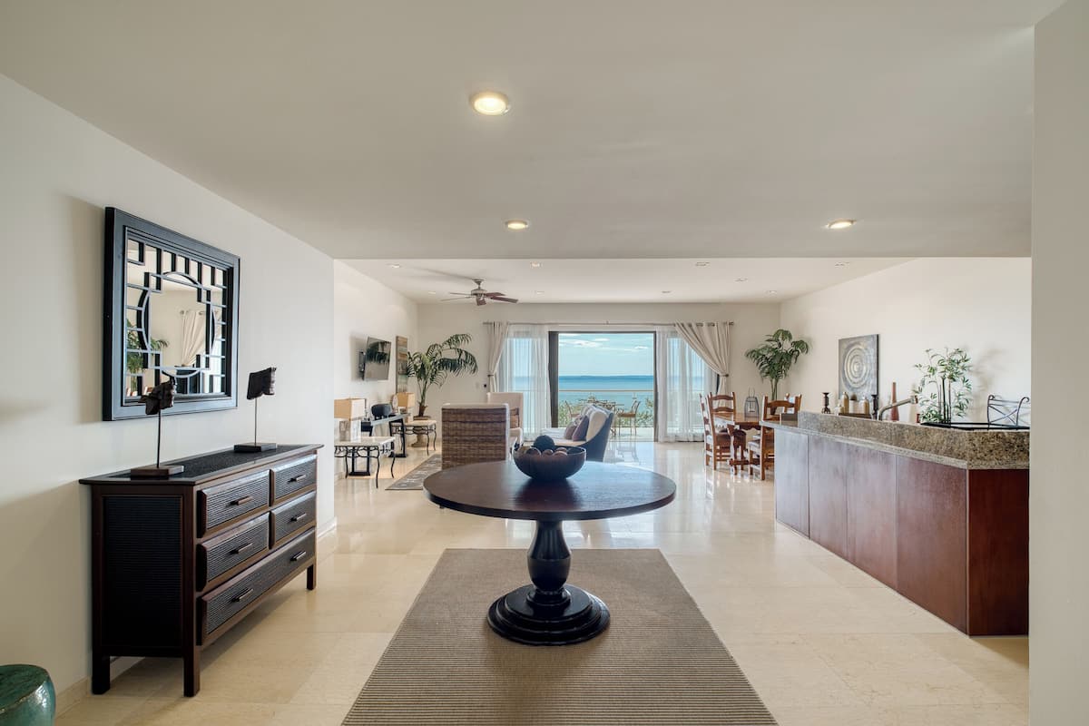 Premium Apartment, 2 Bedrooms, Ocean View | Living room | 55-inch plasma TV with digital channels, TV