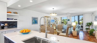 IN GOOD SPIRITS ~ Waterfront Condo, Wrap-Around Balcony & Community Pool!