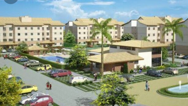 A hotel complex with multiple buildings, a parking lot, and a swimming pool. - Apartment in milionários beach, Ilheus - BA (Ilheus)