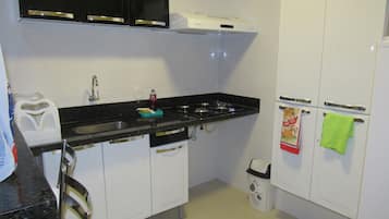 Fridge, microwave, stovetop, cookware/dishes/utensils