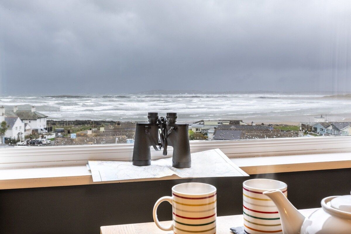 Stunning sea views over Rhosneigr Bay from the living room, pet-friendly holiday apartment in Rhosneigr, Anglesey