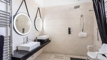 Shower, hair dryer, towels