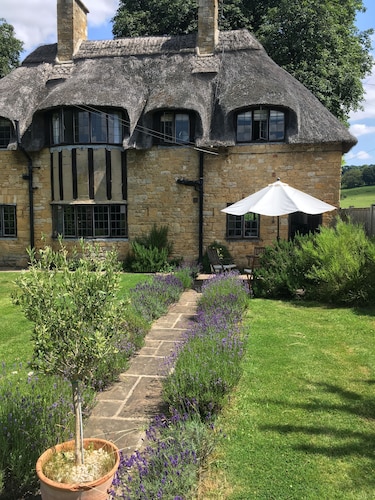 Cotswolds Thatch Cottage, located in Broadway, Cotswolds England.