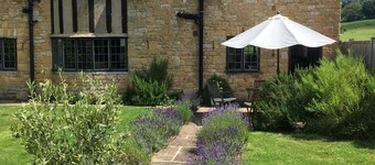 Cotswolds Thatch Cottage, located in Broadway, Cotswolds England.