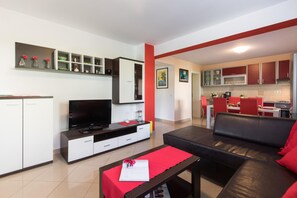 Apartment, 2 Bedrooms | Living area | Flat-screen TV