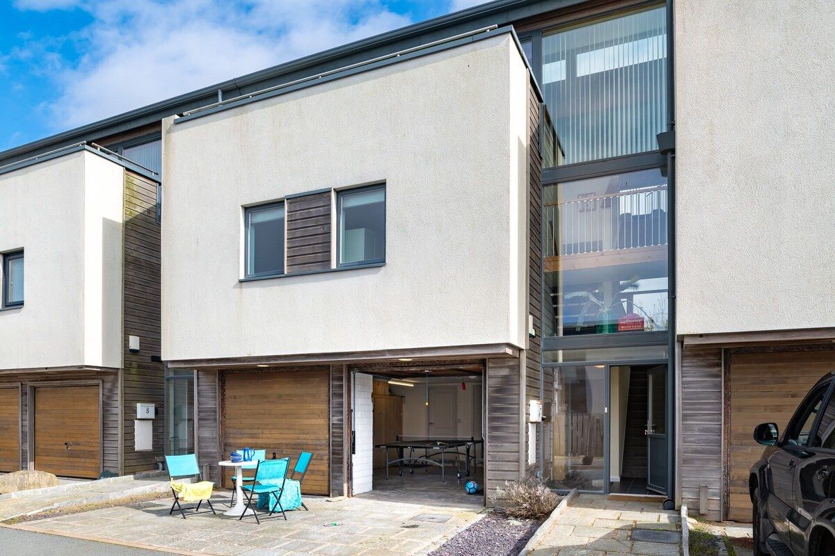 Exterior of The View, three-storey upside-down pet-friendly holiday home sleeping eight, two minutes from Crigyll Beach in Rhosneigr, Anglesey