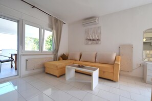 Apartment, 1 Schlafzimmer | Wohnbereich | Flachbildfernseher