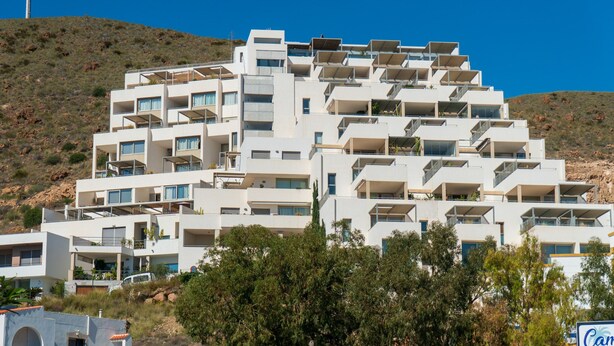 A multi-story building with balconies, located on a hillside. - Casa Jurinea Beach with sea view and pool (Carboneras)