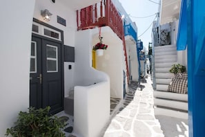 Stroll through a charming, historic alleyway lined with traditional buildings.
