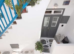 Stroll down this charming street to a building with a welcoming entrance.