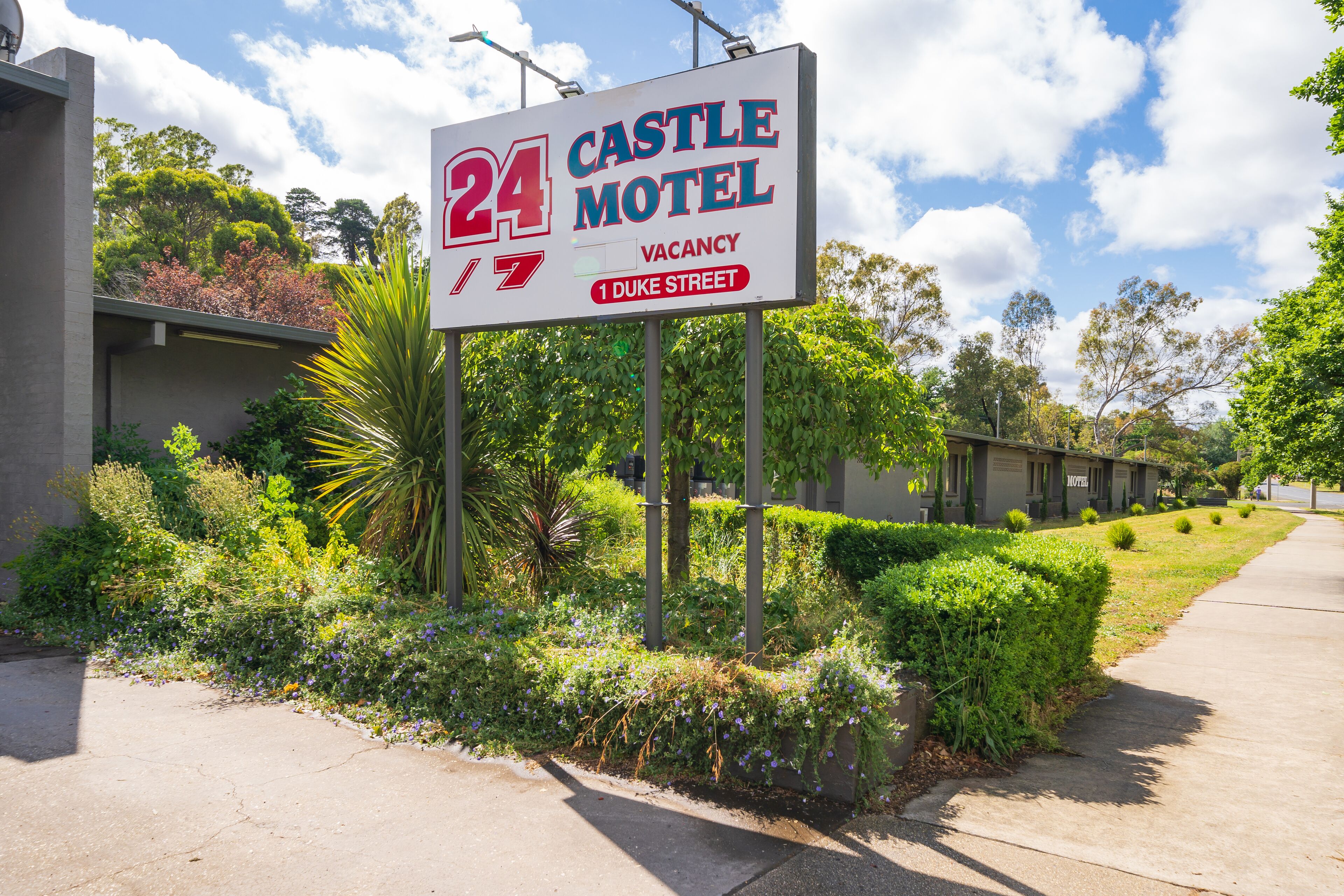 A motel sign with the name 'Castle Motel' and the number '24' indicating the number of rooms. The sign also mentions 'Vacancy' and is located on Duke Street.