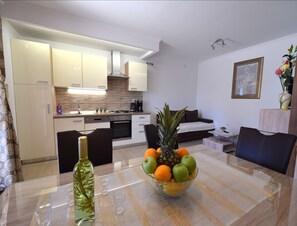 Apartment, 2 Bedrooms (652 - priz) | Living area | Flat-screen TV - Apartments Skrabonja (Dobrinj)