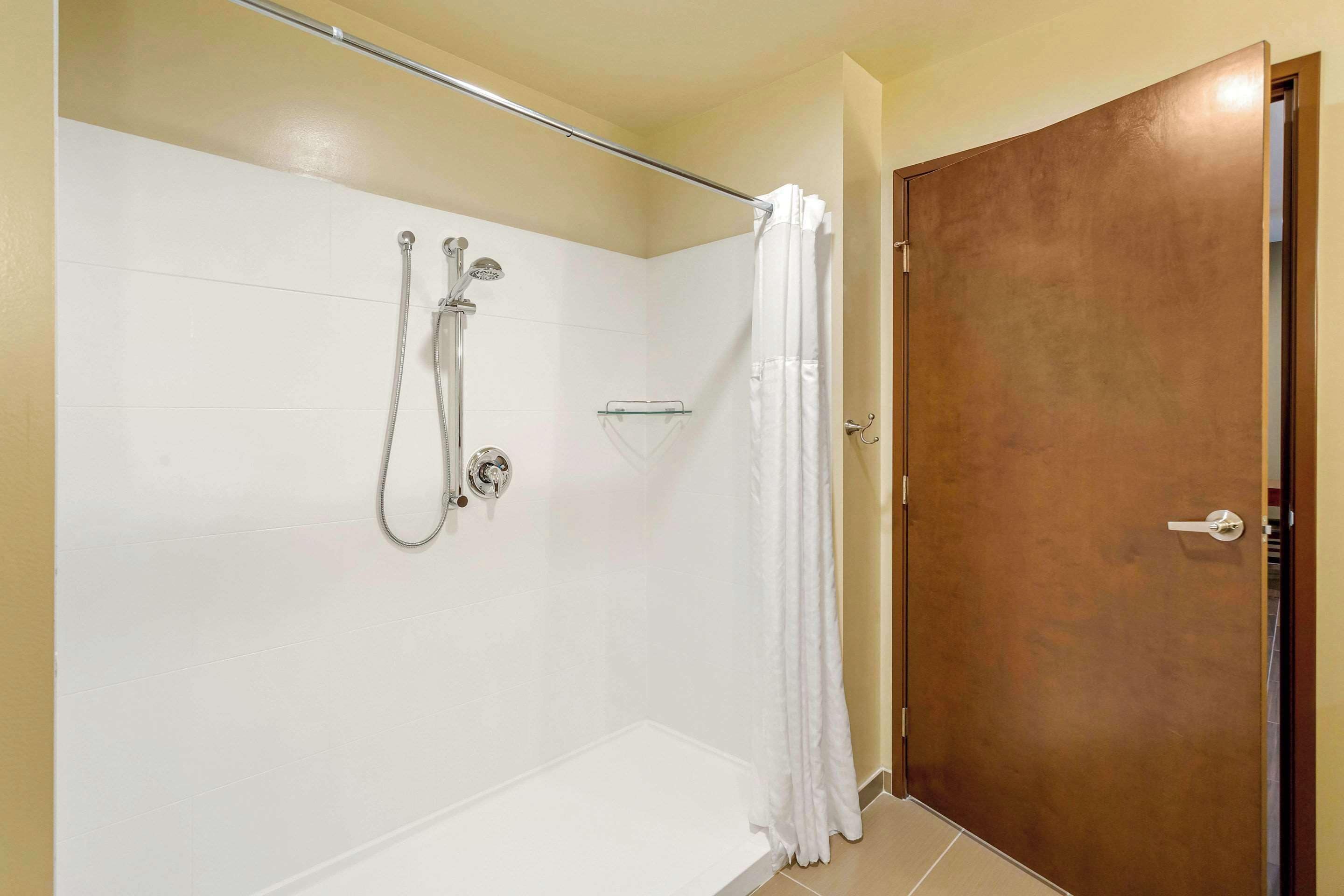 down duvets, pillow-top beds, desk, laptop workspace