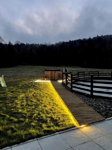 Chalet luxueux avec bain nordique, piscine privée chauffée, sauna et pétanque