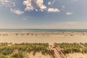 On the beach, sun-loungers, beach towels