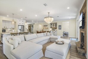 Smart TV, fireplace, books, offices