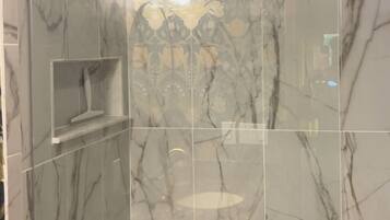 Bathtub, jetted tub, hair dryer, towels