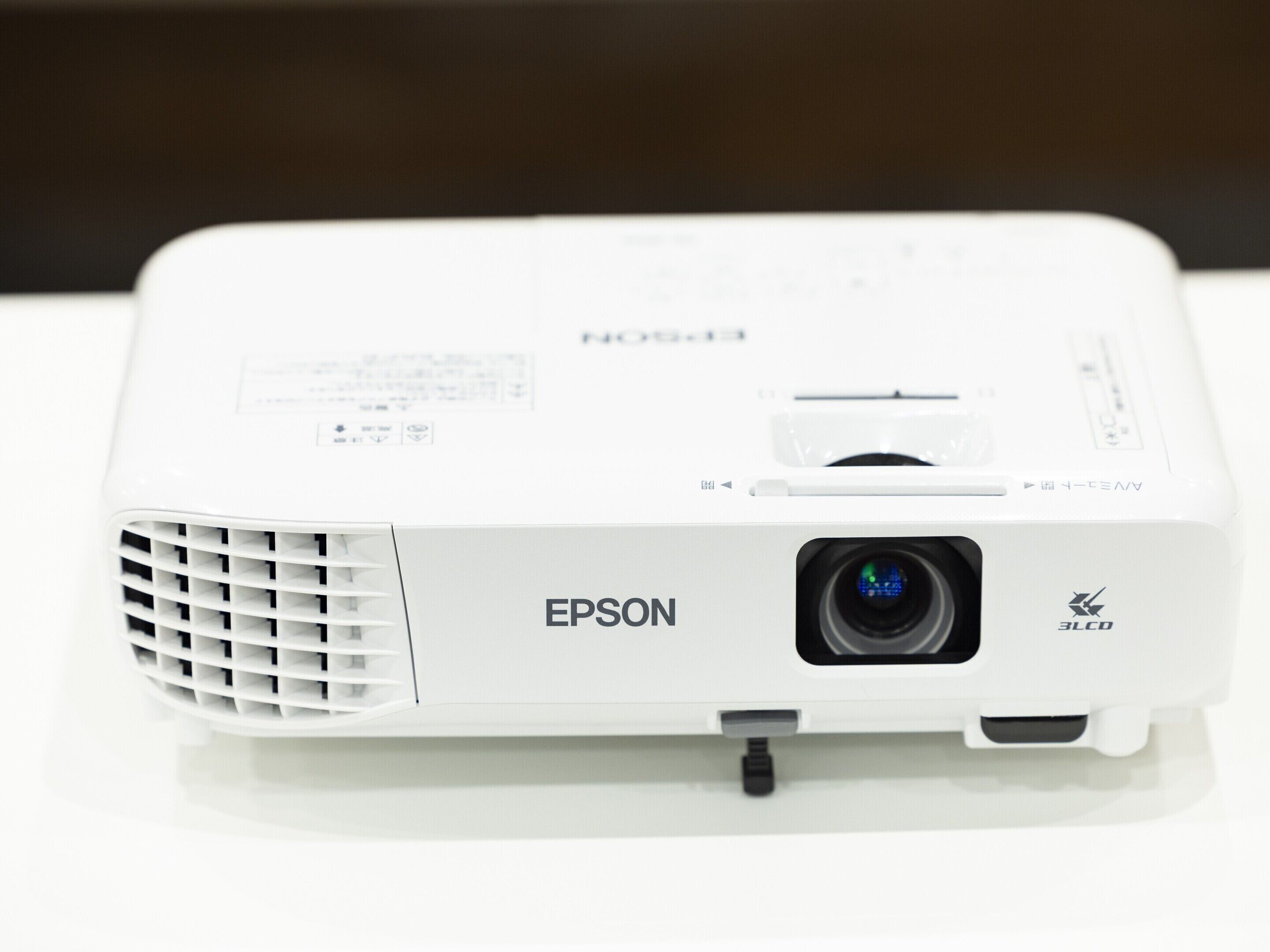 A white Epson 3LCD projector with a lens, ventilation grill, and front port.