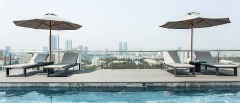 Outdoor pool, open 6:30 AM to 9:30 PM, sun loungers