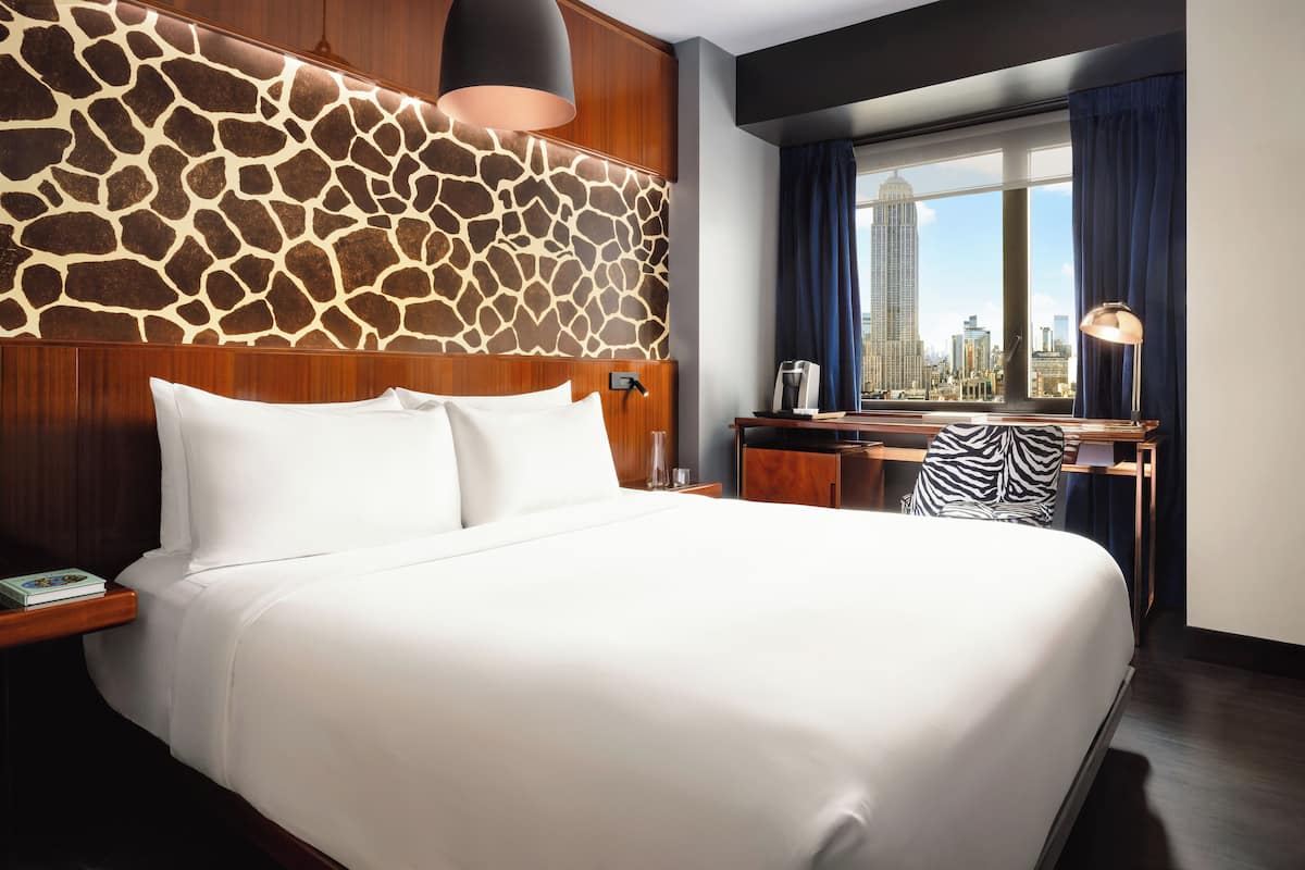 Room, 1 King Bed (Empire State View) | In-room safe, desk, soundproofing, iron/ironing board