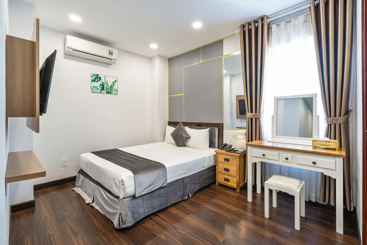 Basic Double Room, 1 Queen Bed, Non Smoking, City View | 1 bedroom, minibar, in-room safe, individually decorated
